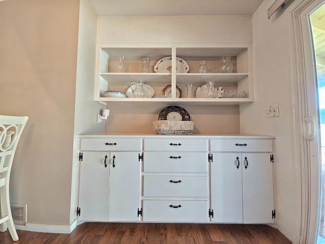 interior details featuring hardwood / wood-style floors