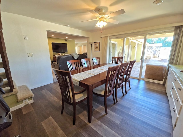 dining room featuring ceiling fan and dark hardwood / wood-style floors