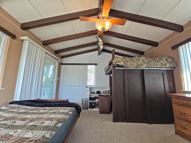 bedroom with carpet, vaulted ceiling with beams, and ceiling fan