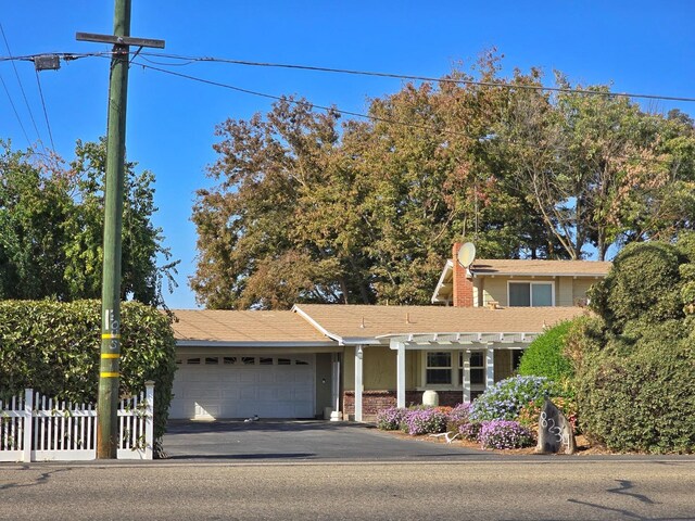 view of front of home with a garage