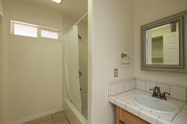 bathroom with vanity, shower / bath combination with curtain, and tile patterned flooring