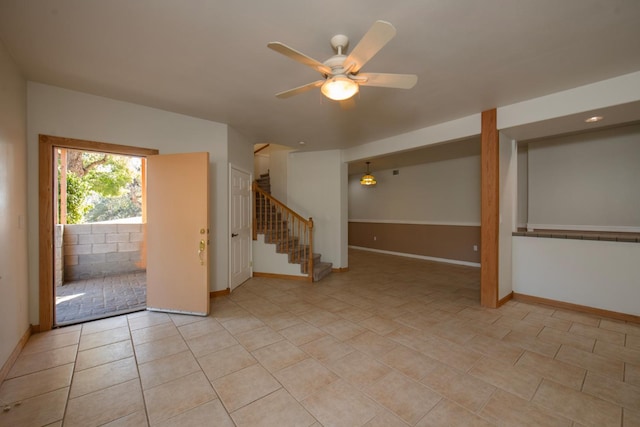 interior space featuring ceiling fan