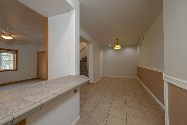 interior space featuring light tile patterned floors