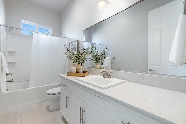 full bathroom with vanity, toilet, tile patterned floors, and shower / bath combo with shower curtain