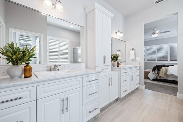 bathroom featuring vanity, ceiling fan, tile patterned flooring, and a shower with door