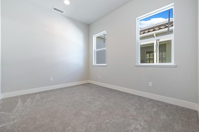 empty room featuring carpet floors