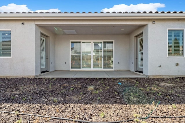 back of house featuring a patio