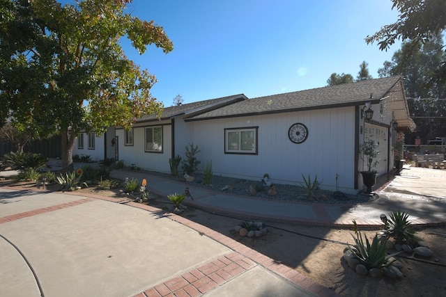 ranch-style house featuring a patio area