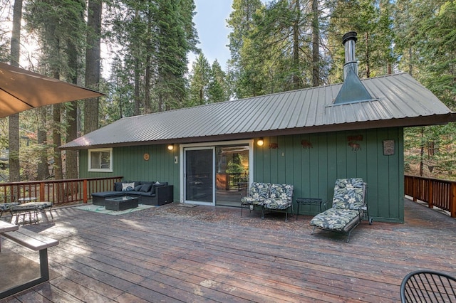 wooden deck with outdoor lounge area