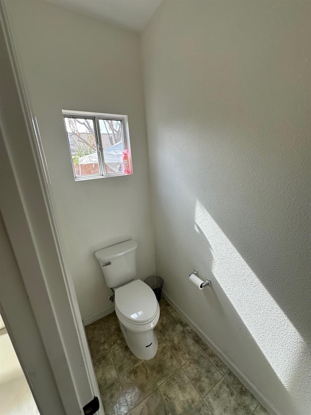 bathroom featuring toilet