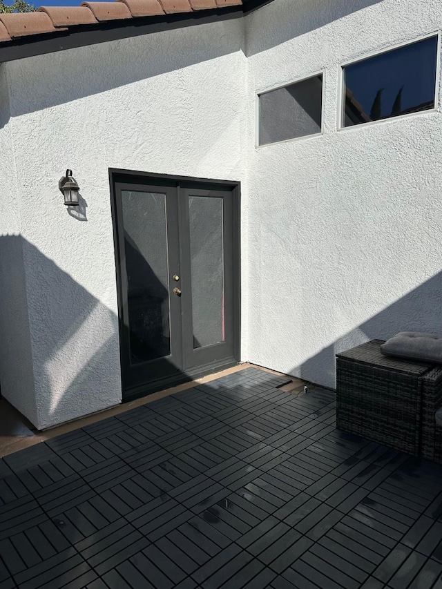 wooden deck with french doors