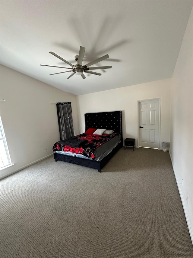 unfurnished bedroom featuring carpet flooring and ceiling fan