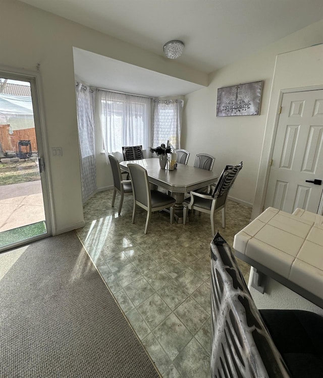 dining room featuring a healthy amount of sunlight