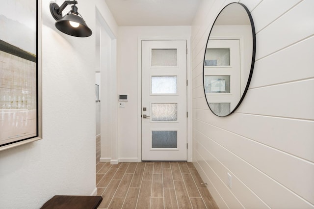 doorway with light hardwood / wood-style flooring