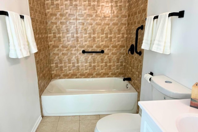 full bathroom with vanity, toilet, tile patterned flooring, and tiled shower / bath