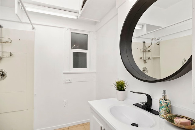 bathroom with vanity and tile patterned floors