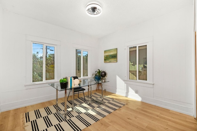 home office featuring hardwood / wood-style flooring