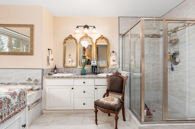 bathroom with vanity and walk in shower