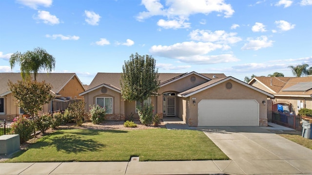 single story home featuring a garage and a front lawn