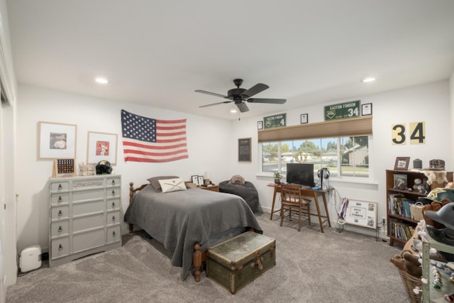 carpeted bedroom featuring ceiling fan