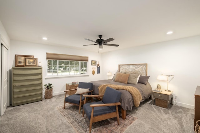 carpeted bedroom with ceiling fan