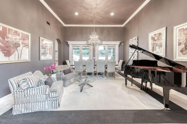 sitting room featuring french doors, a notable chandelier, and carpet flooring