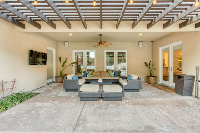 view of patio / terrace with french doors, an outdoor living space, ceiling fan, and a pergola