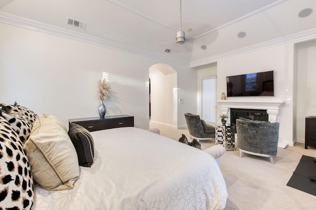 carpeted bedroom with ornamental molding