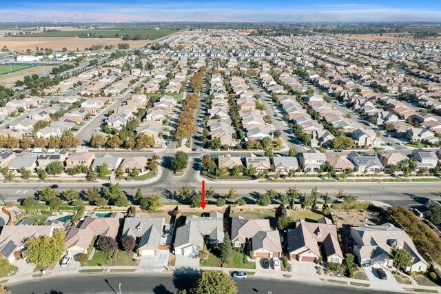 3313 Whiteash Ave, Clovis, CA 93619 - aerial view of property and surrounding area featuring nearby suburban area