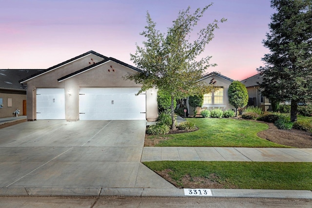 3313 Whiteash Ave, Clovis, CA 93619 - ranch-style house with a garage, stucco siding, concrete driveway, and a yard