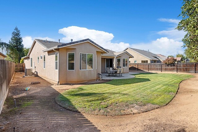 3313 Whiteash Ave, Clovis, CA 93619 - back of property with central AC unit, a patio area, stucco siding, and a tiled roof