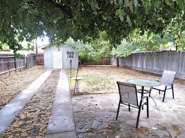 view of patio with a shed