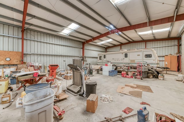 3080 N Grantland Ave, Fresno, CA 93723 - garage featuring metal wall and a workshop area