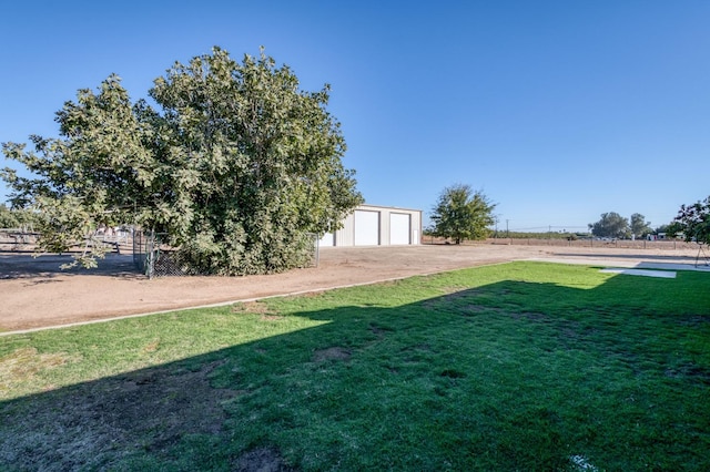 view of yard featuring a garage