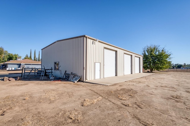 view of outbuilding featuring a garage