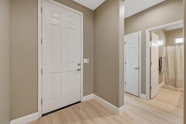 entryway with light wood-type flooring