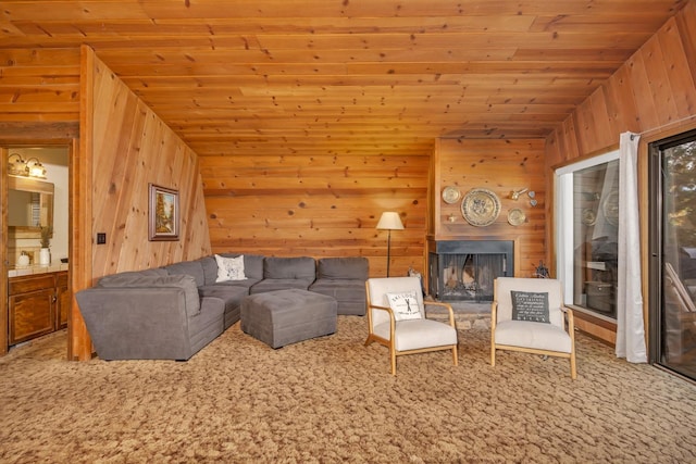 unfurnished living room featuring wooden walls, light carpet, and wooden ceiling