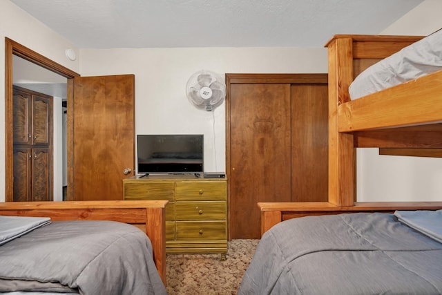 bedroom featuring carpet flooring