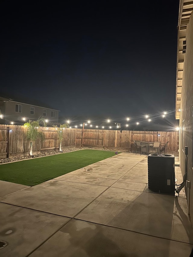 patio at twilight with a lawn