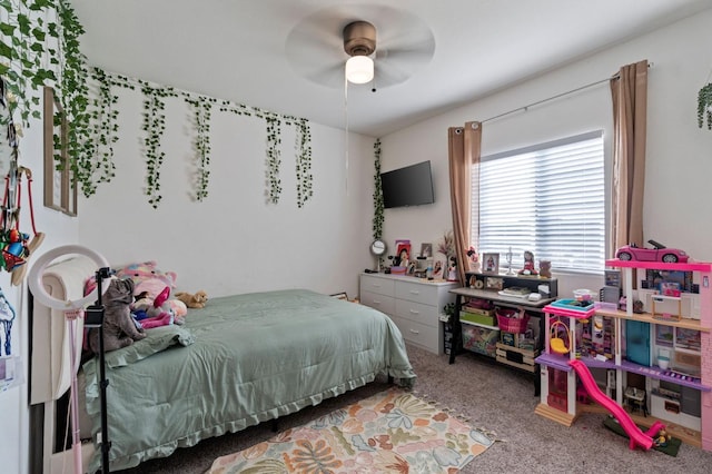 carpeted bedroom with ceiling fan