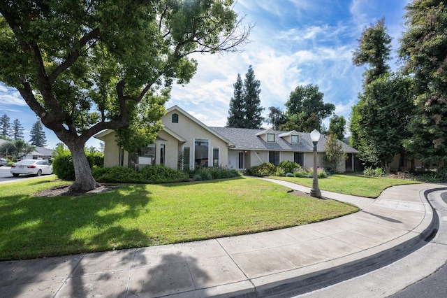 view of front of house with a front lawn