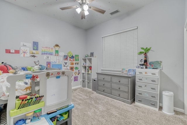 bedroom featuring light carpet and ceiling fan