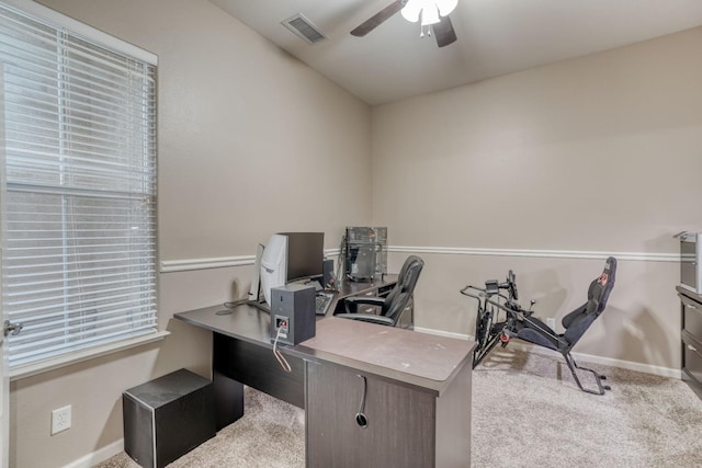 office area with carpet floors and ceiling fan