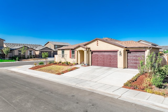 ranch-style home featuring a garage