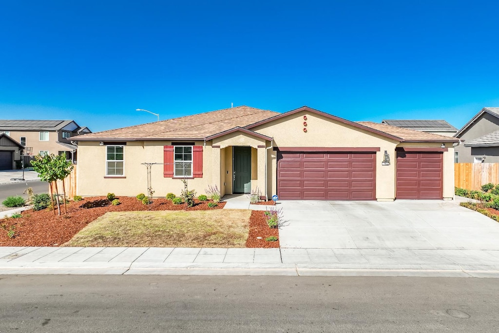 ranch-style house with a garage