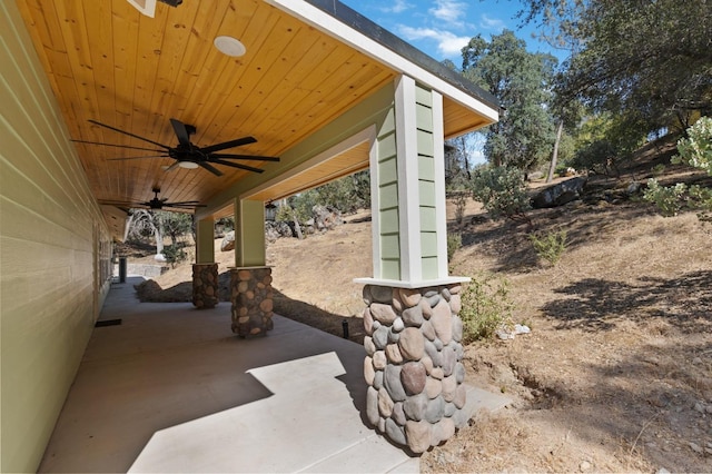 view of patio / terrace featuring a ceiling fan and visible vents