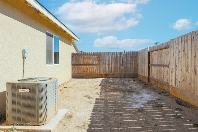 view of yard featuring central AC unit