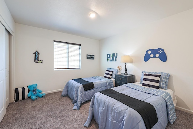 carpeted bedroom featuring a closet