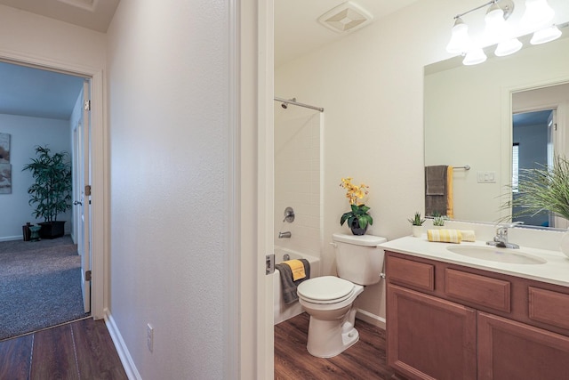 full bathroom featuring shower / bath combination, vanity, wood-type flooring, and toilet