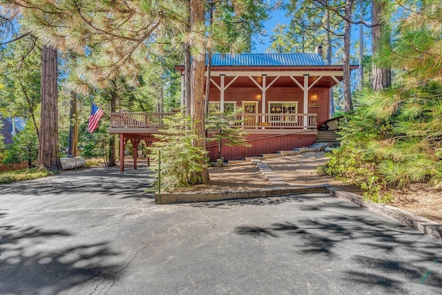 view of front of house featuring a wooden deck